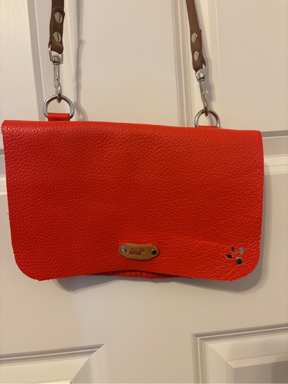 Red Pebbled Leather Crossbody Bag with Brown Strap